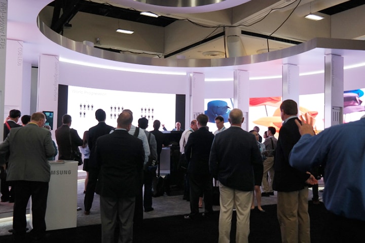 Samsung LEDs people listening a speech at the Samsung's Lightfair International 2016 show booth (outside view)