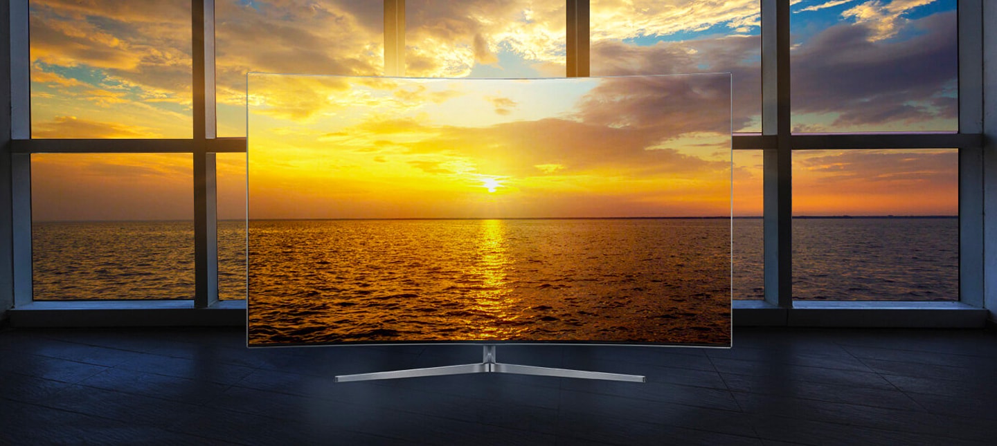 Samsung LEDs a bezel-less slim tv showing a seamlessly connected image of sunset inside a tv and outside