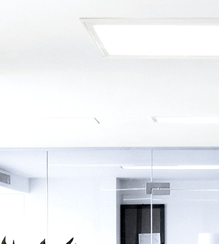 Samsung LEDs spaceous office bright with ceiling light turned on.