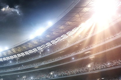 Samsung LEDs football stadium lights shining towards the sky in an outdoor field
